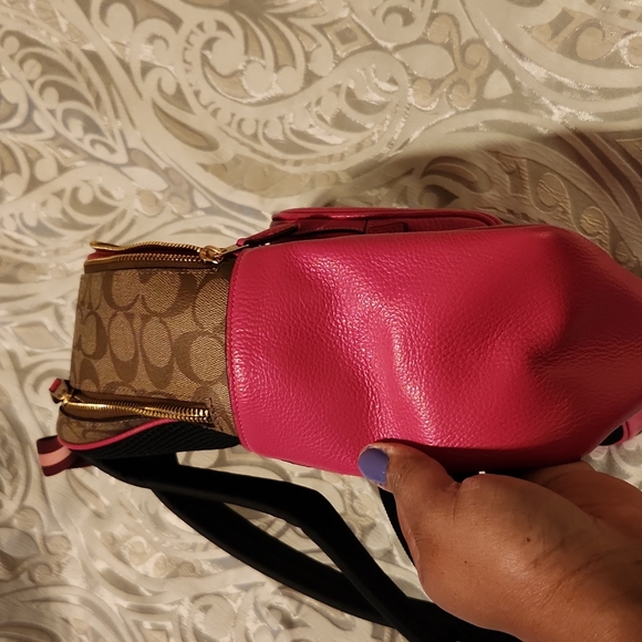Like new pink coach backpack along with wristlet and small wallet - Picture 6 of 12